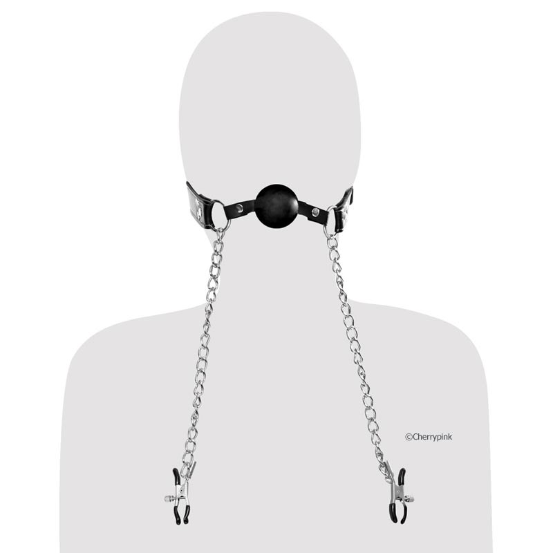Fetish Fantasy Deluxe Ball Gag with Nipple Clamps Black on a Silhouette Person.