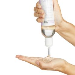 Waterglide Tingling Lubricant in a 300 ml Bottle Been Squeezed Into a Women's Hand