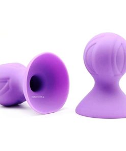 The nipple sucking sex toys Sitting on a White Background