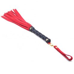 Red whip with black handle
