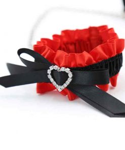 Red and black wrist cull with light metal chain