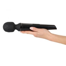 The Rechargeable Power Wand in the flat palm of a women's hand