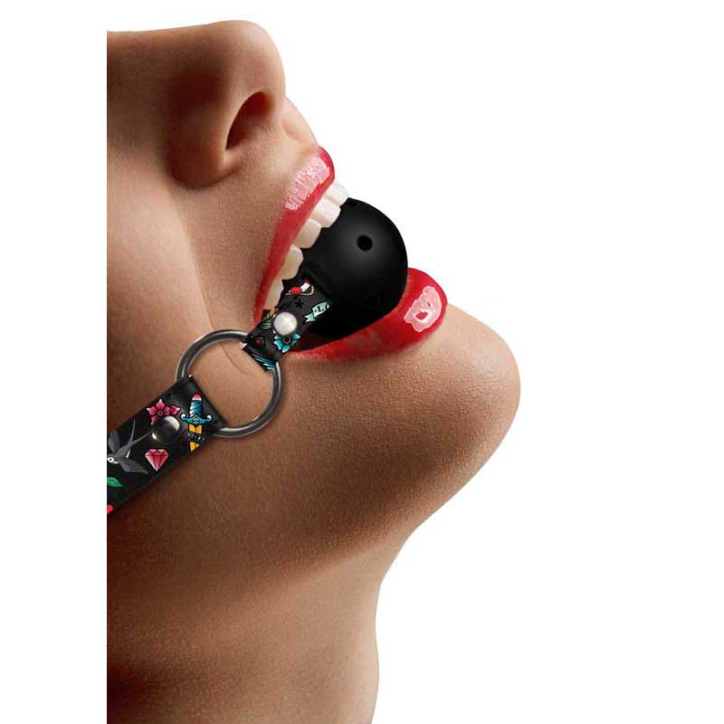 A model with Breathable Ball Gag Old School Tattoo Style on her mouth