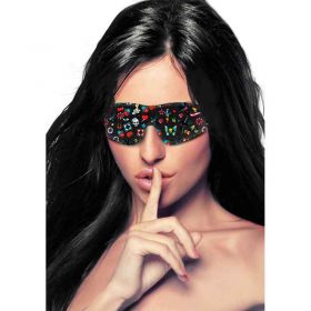 A dark haired model wearing the Printed Eye Mask Old School Tattoo Style
