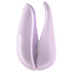 The purple coloured clitoral vibrator with its travel cover on a white background