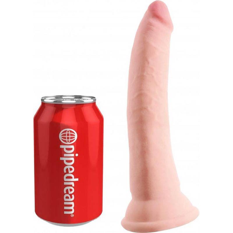 flesh colour king cock beside a red can