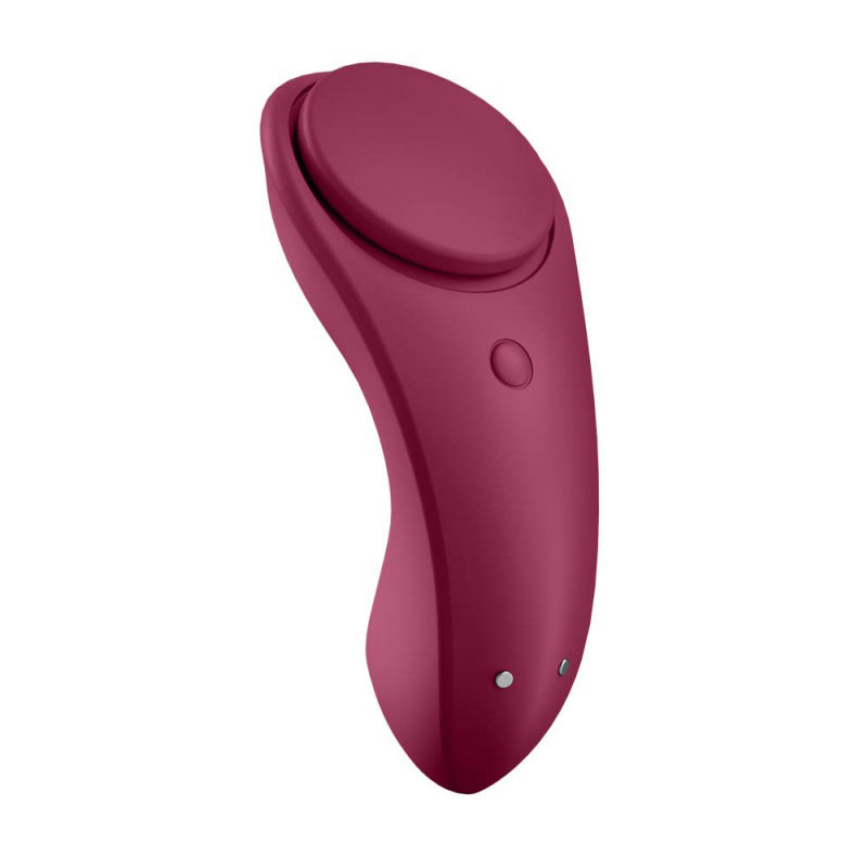 The purple Satisfyer sexy secret panty vibrator with its magnet holder in place