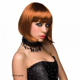 Cici Red wig on a female model standing on a white background wearing a black dress