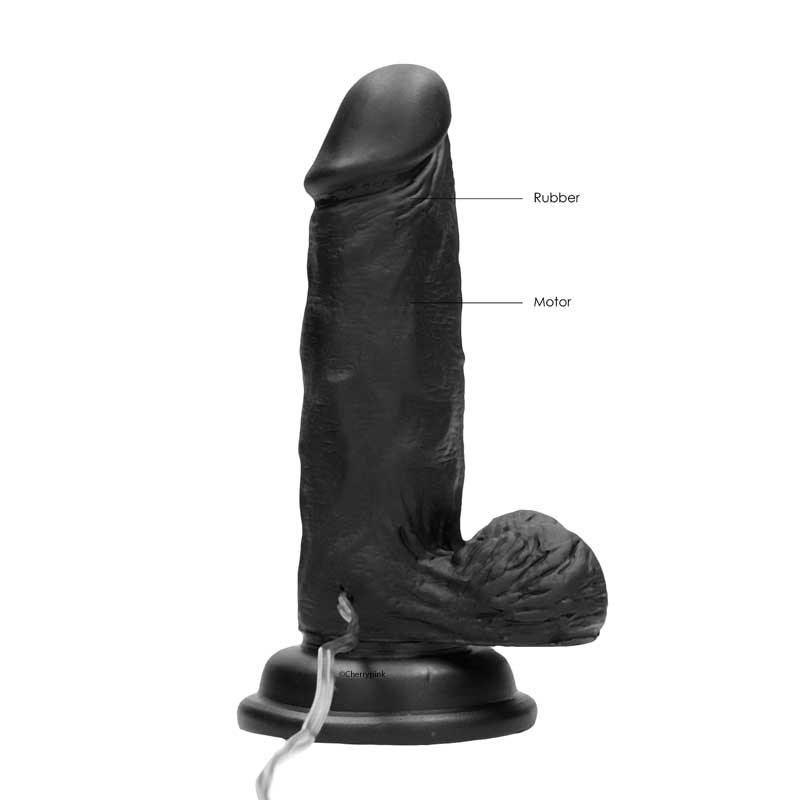 Realrock Vibrating Realistic Black Cock showing the rubber and motor.