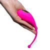 The pink egg vibrator in a Female Hand