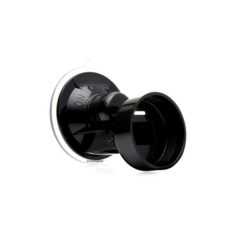 The Fleshlight Shower Mount Hands-Free Adaptor in Black Stuck to a White Background