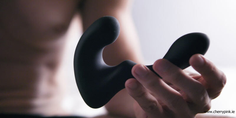 Most Popular Sex Toys For Men Blog Image of a Man Holding a Male Sex Toy