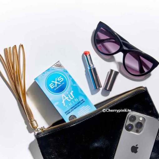 Sunglass, Lipstick Vibrator, Whip, iPhone, and EXS Thin Condoms in a Handbag