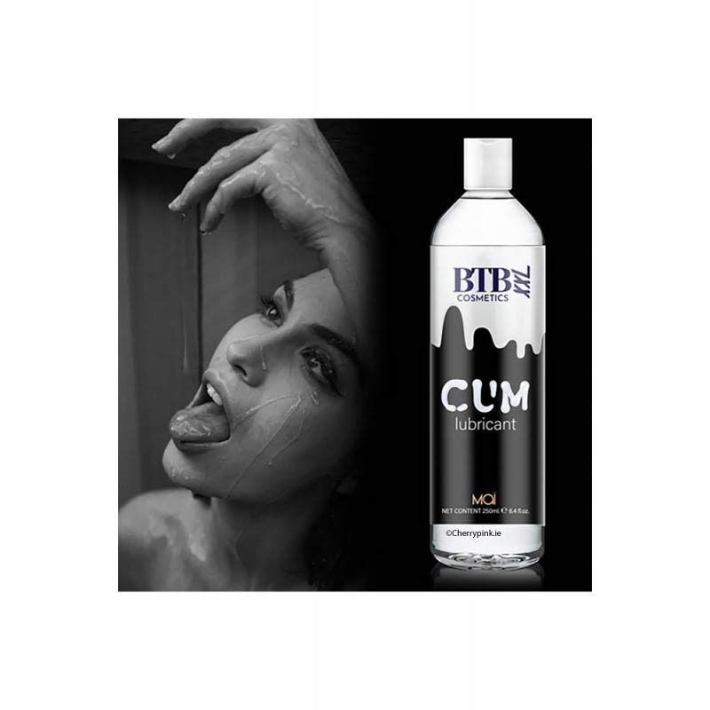 A woman's face covered in the cum lube and a bottle of lube beside her