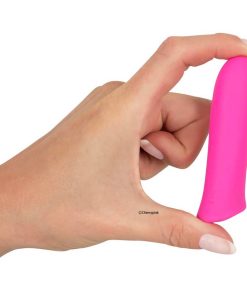 Sweet Smile Rechargeable Power Bullet held between a finger and thumb of a female hand.