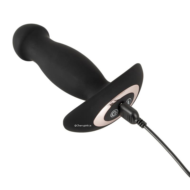 The Black Prostate Anal Massager with the Rechargeable cable plugged in.