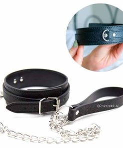 Black Bondage Collar and Lead and an inserted image of female hands holding the collar.