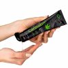 A Women Pouring the Orige gel into her hand from the black tube