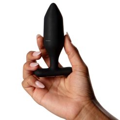 The black butt plug in a women's hand
