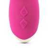 The two control buttons on the handle of the pink vibrator