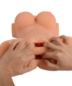 Male hands showing the inside texture of the sex toy doll