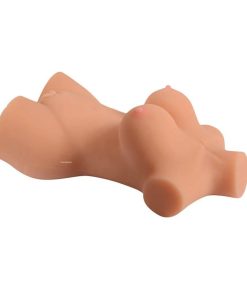 The sex toy doll lying on its side