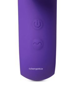 The Handle With Two Buttons On The Purple Thrusting Rabbit Vibrator With Heating Function