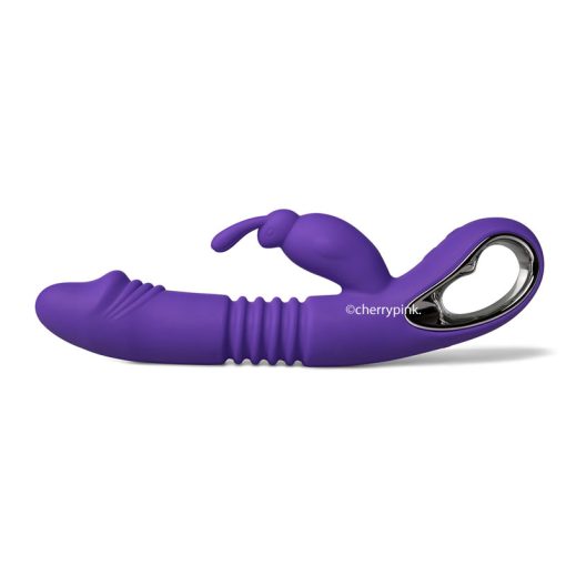 The purple vibrator lying on its back