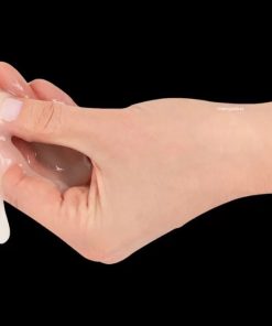 Fake sperm running through a women's fingers