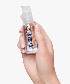 Swiss Navy Warming Lubricant 29.5 ml in a Women's Hand