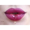 Lick It Erotic Massage Oral Gel on a Women's lips